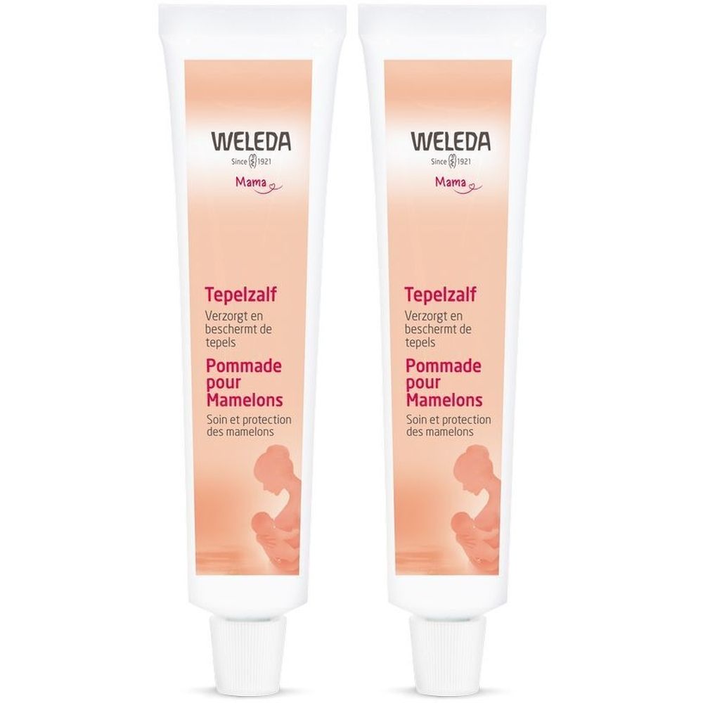 Deux tubes de Weleda Mama Onguent Pour Mamelons. Tubes blancs avec texte et illustrations. Inscription: Pommade pour Mamelons.