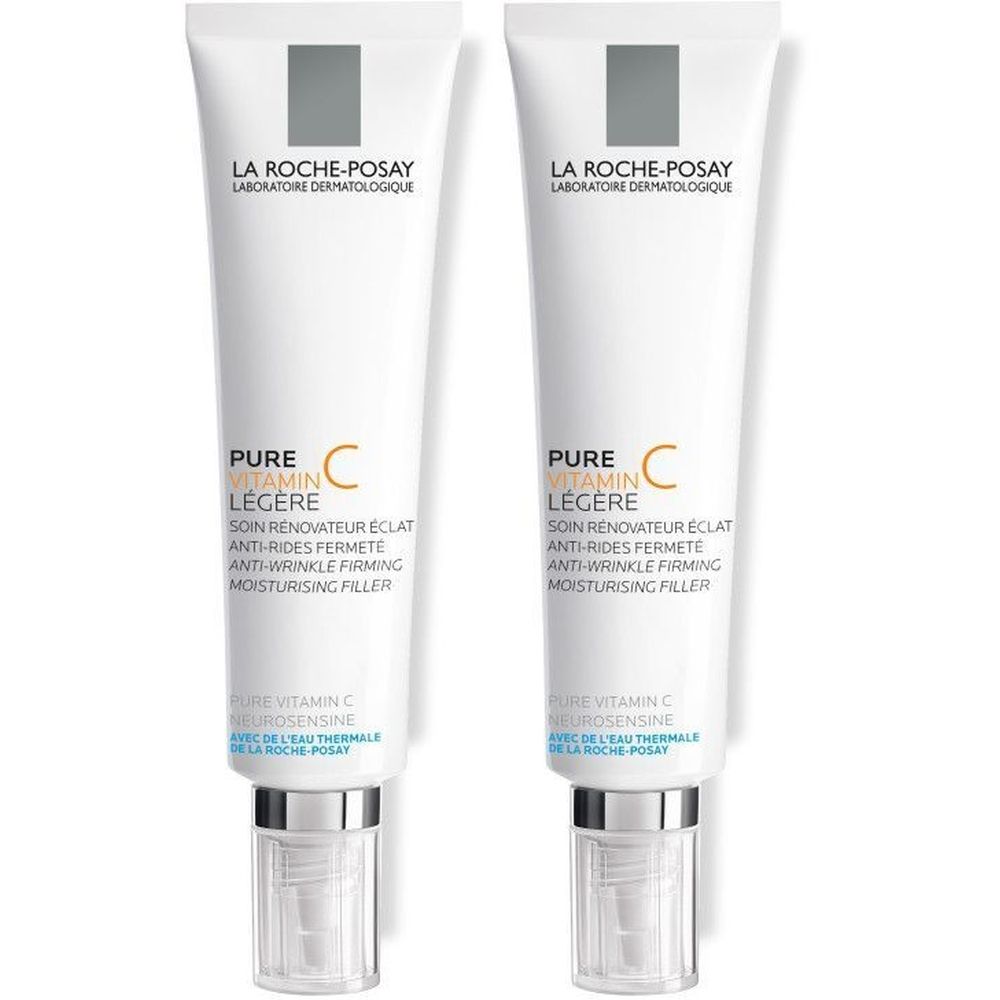Twee crèmetubes. Opschrift: La Roche-Posay, Pure Vitamin C Légère. Witte tube met zilveren dop.
