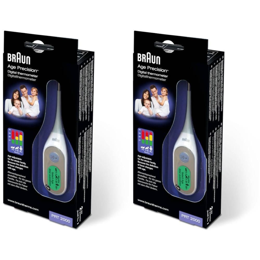 Twee digitale thermometers in verpakking. Merk Braun, model Age Precision. Groen display. Zwarte verpakking.