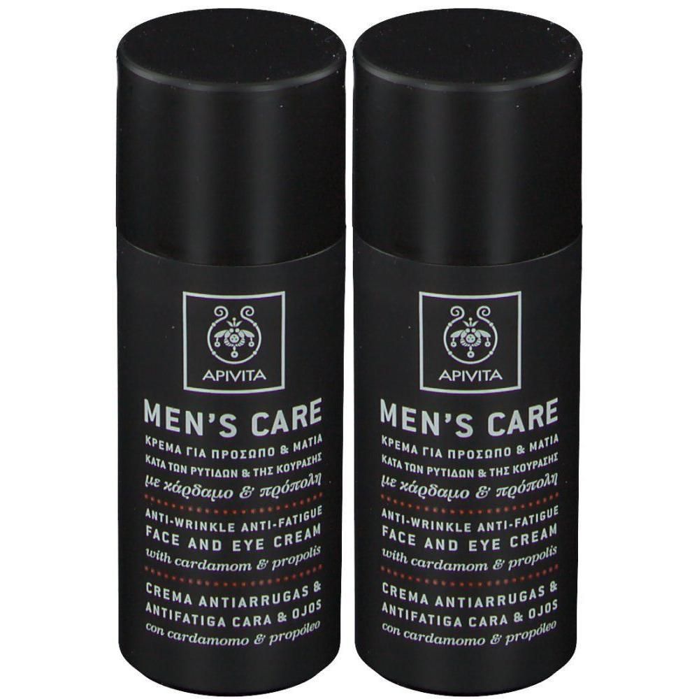 Deux pots noirs de crème anti-rides et anti-fatigue pour hommes APIVITA avec cardamome et propolis.
