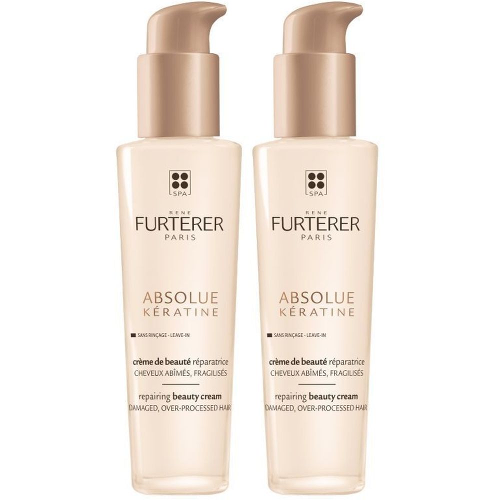 Deux flacons de crème capillaire René Furterer Absolue Kératine. Flacons beiges avec pompe. Inscription: Absolue Kératine, Crème de Beauté Réparatrice.