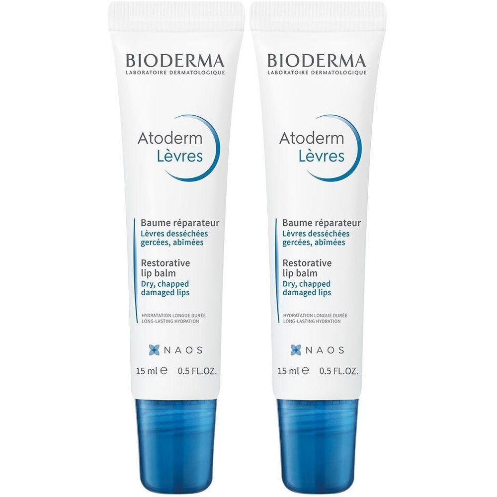 Twee tubes Bioderma Atoderm Lèvres. Witte tubes met blauwe dop. Tekst: Baume réparateur, Restorative lip balm.
