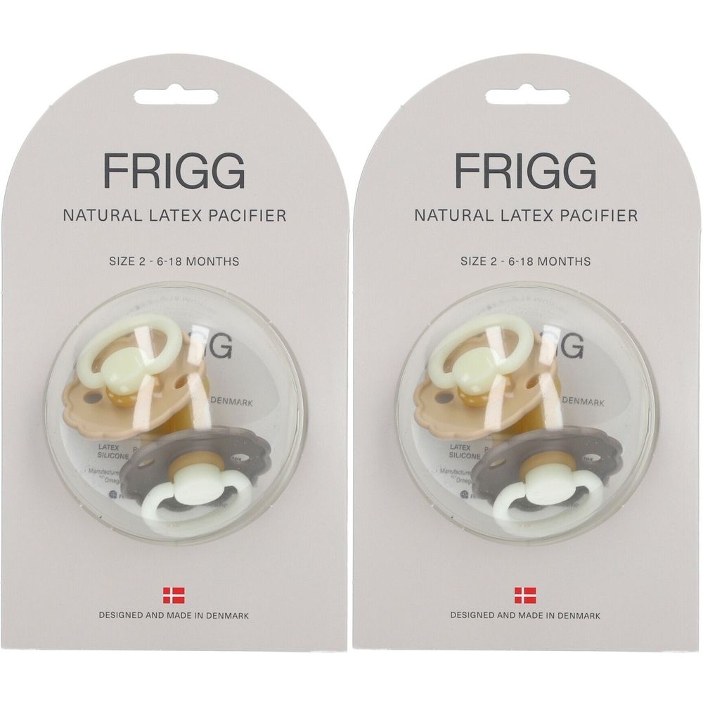 Twee verpakkingen FRIGG fopspenen. Elke verpakking bevat drie fopspenen in verschillende kleuren. Verpakking met productinformatie.