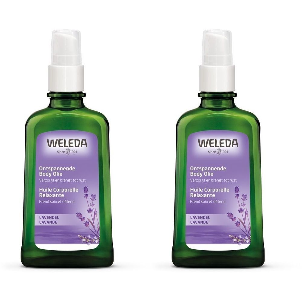 Twee groene flessen met verstuiver. Op het etiket staat "WELEDA" en "Huile Corporelle Relaxante".