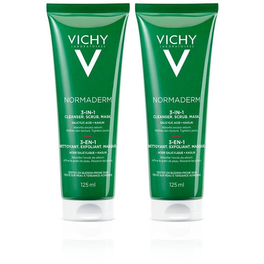 Deux tubes verts avec bouchon blanc. Inscription "VICHY" et "NORMADERM 3-en-1". Texte en français et allemand. 125 ml.