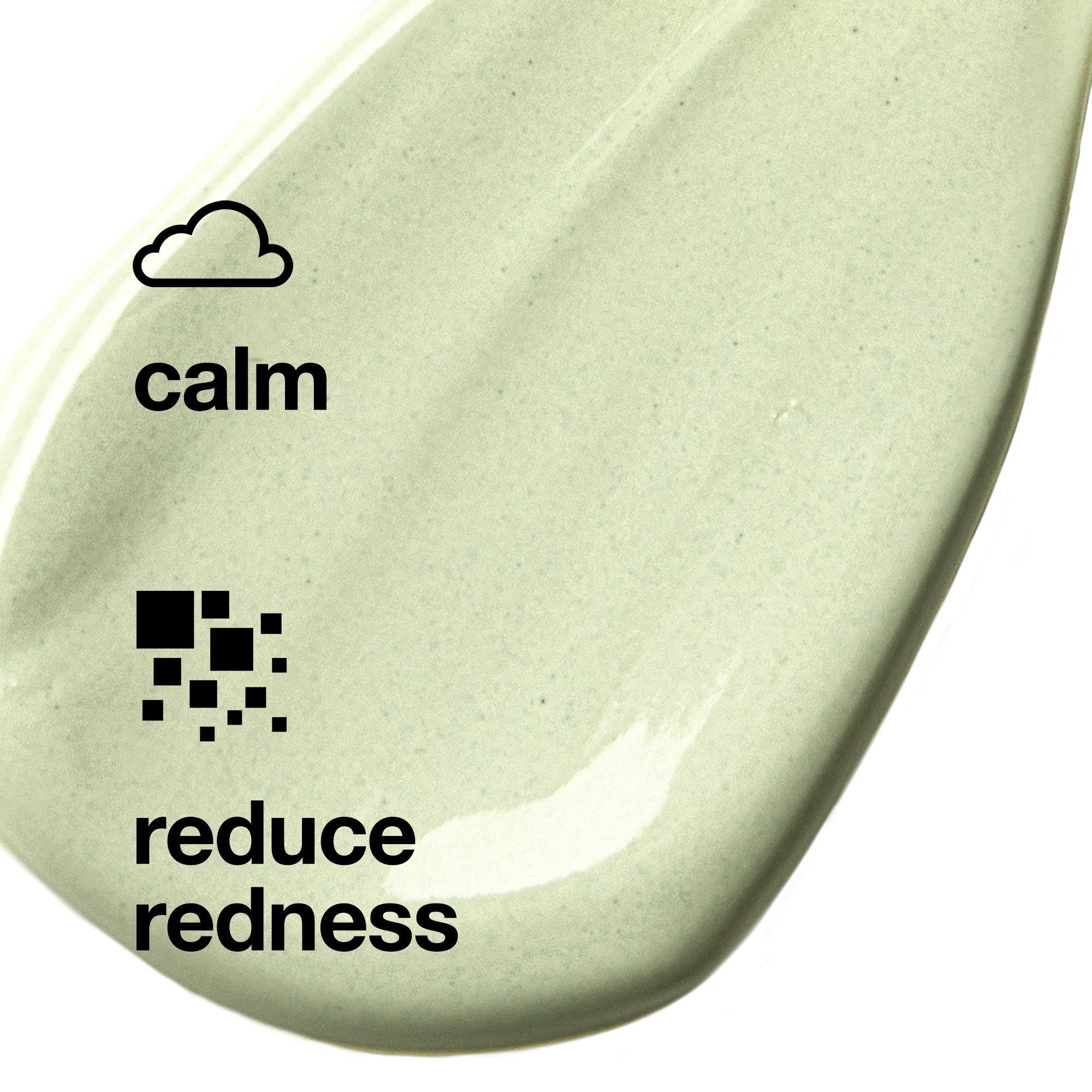 Close-up van een groene crème met symbolen: wolk voor 'calm' en vierkanten voor 'reduce redness'.
