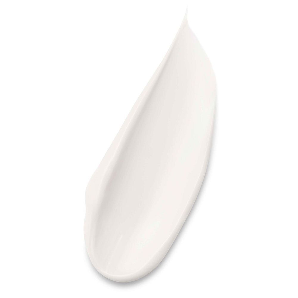 Close-up van een klodder crème. Witte crème, langwerpige vorm.