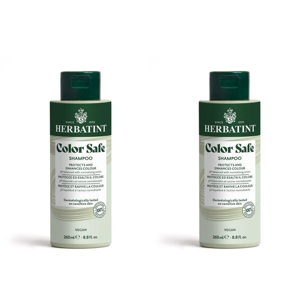 Deux flacons de shampooing Herbatint Color Safe. Étiquettes vert et blanc, bouchons verts. Label Vegan.