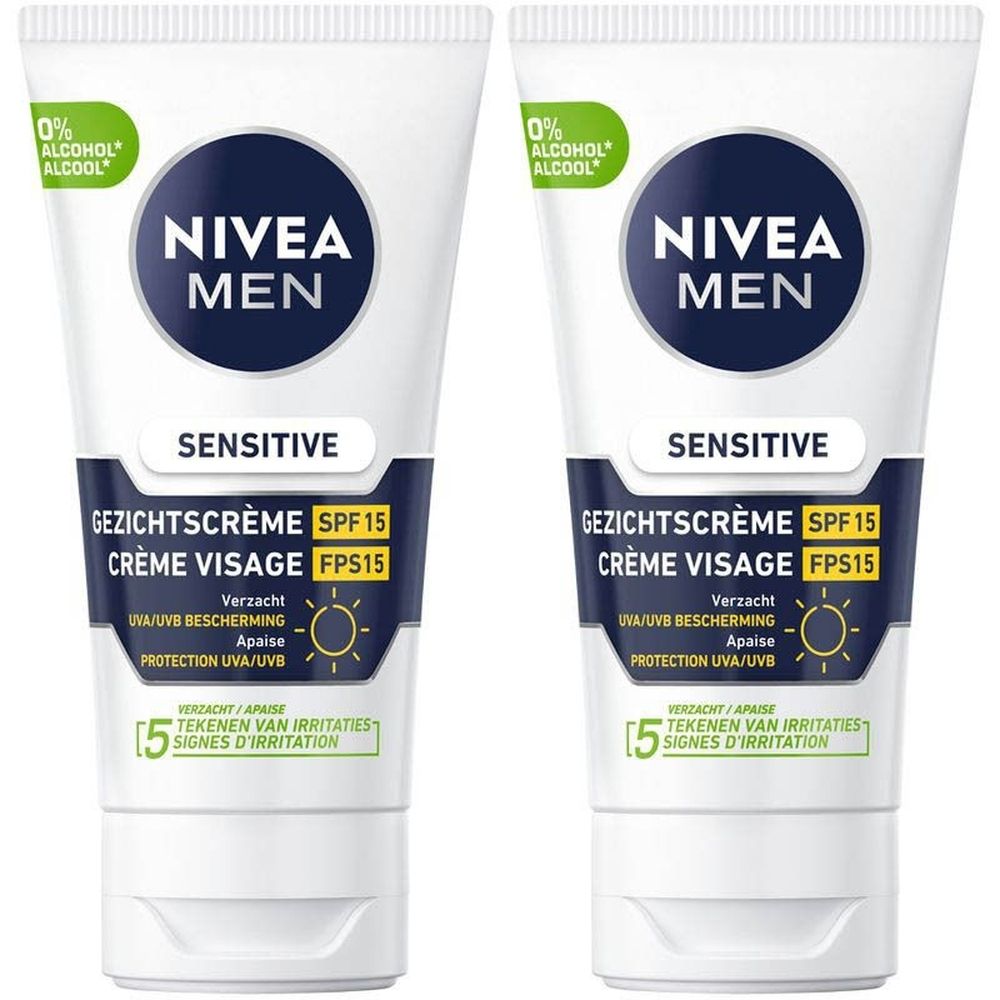 Twee tubes Nivea Men Sensitive Crème Visage SPF15. Witte tubes met blauwe en zwarte tekst. 0% alcohol.