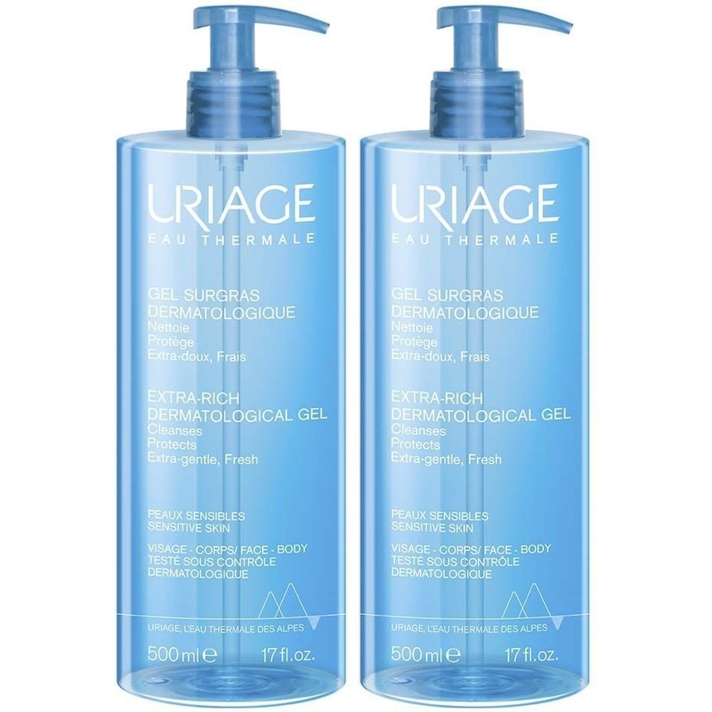 Twee blauwe flessen met pomp. Opschrift: Uriage Eau Thermale, Gel Surgras Dermatologique, 500 ml.
