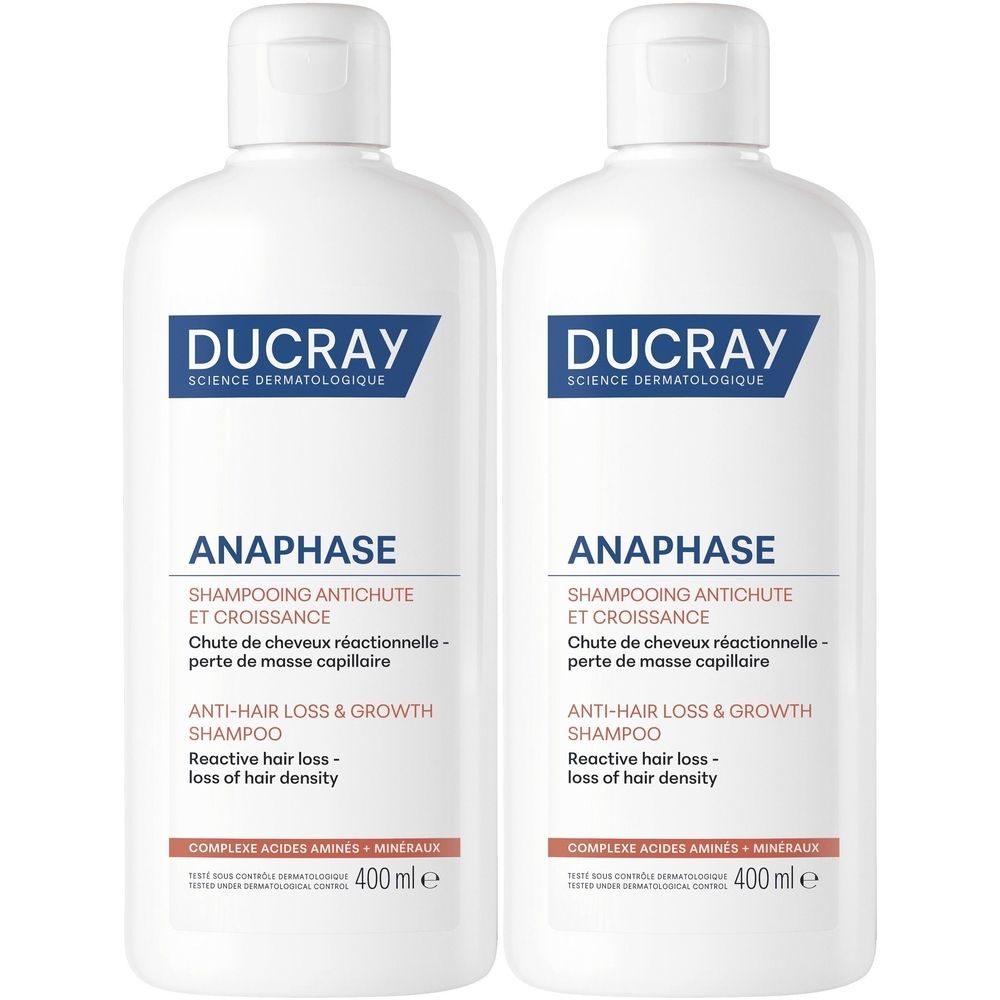 Twee witte flessen Ducray Anaphase shampoo. Opschrift: Shampooing Antichute et Croissance, Anti-haaruitval & haargroei shampoo.