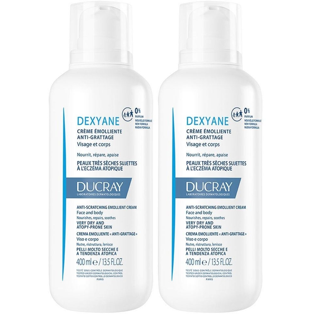 Twee witte flessen Dexyane crème. Opschrift: Crème Emolliente Anti-grattage, voor gezicht en lichaam. Merk Ducray.