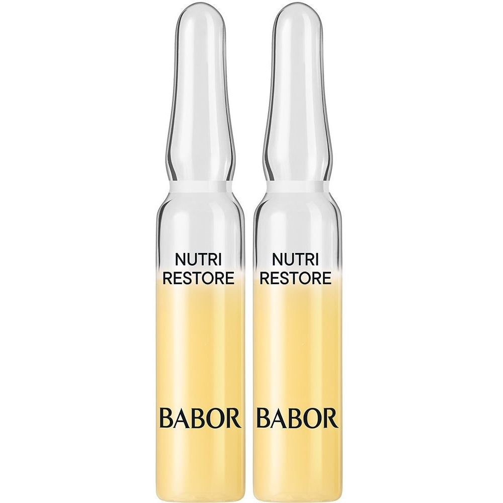 Deux ampoules en verre contenant un liquide jaune. "NUTRI RESTORE" et "BABOR" sont inscrits sur chacune.