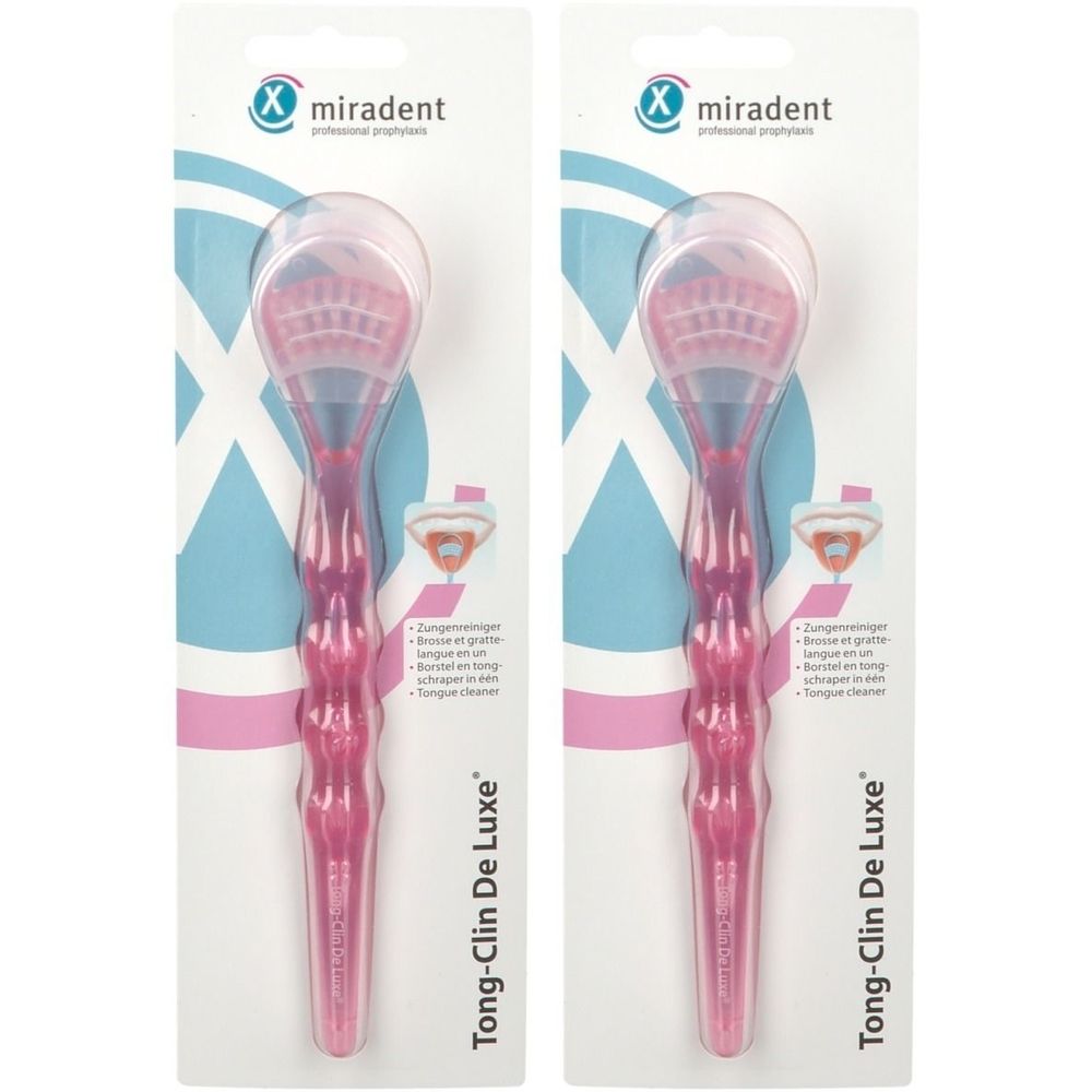 Twee roze tongschrapers in blisterverpakking. Merk Miradent, model Tong-Clin De Luxe. Met transparante bescherming.