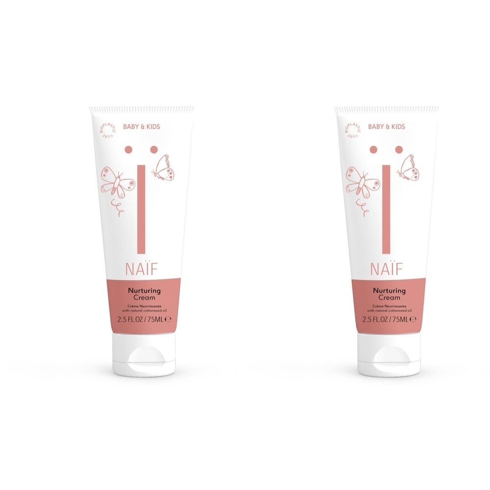 Twee tubes Naïf Baby & Kids Nurturing Cream. Witte tubes met roze accenten en vlinder illustraties. Productnaam duidelijk zichtbaar.