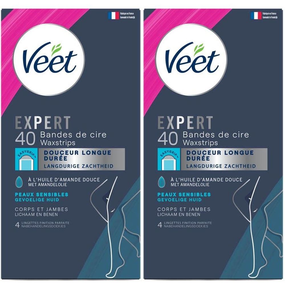 Twee verpakkingen Veet Expert ontharingsstrips voor de gevoelige huid. Donkerblauwe verpakking met productnaam en details.