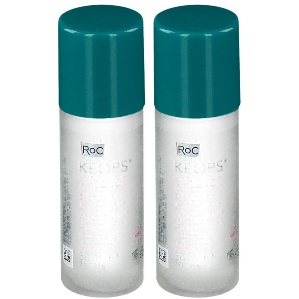 Twee deodorant sticks met groene doppen. Opschrift: RoC Keops.