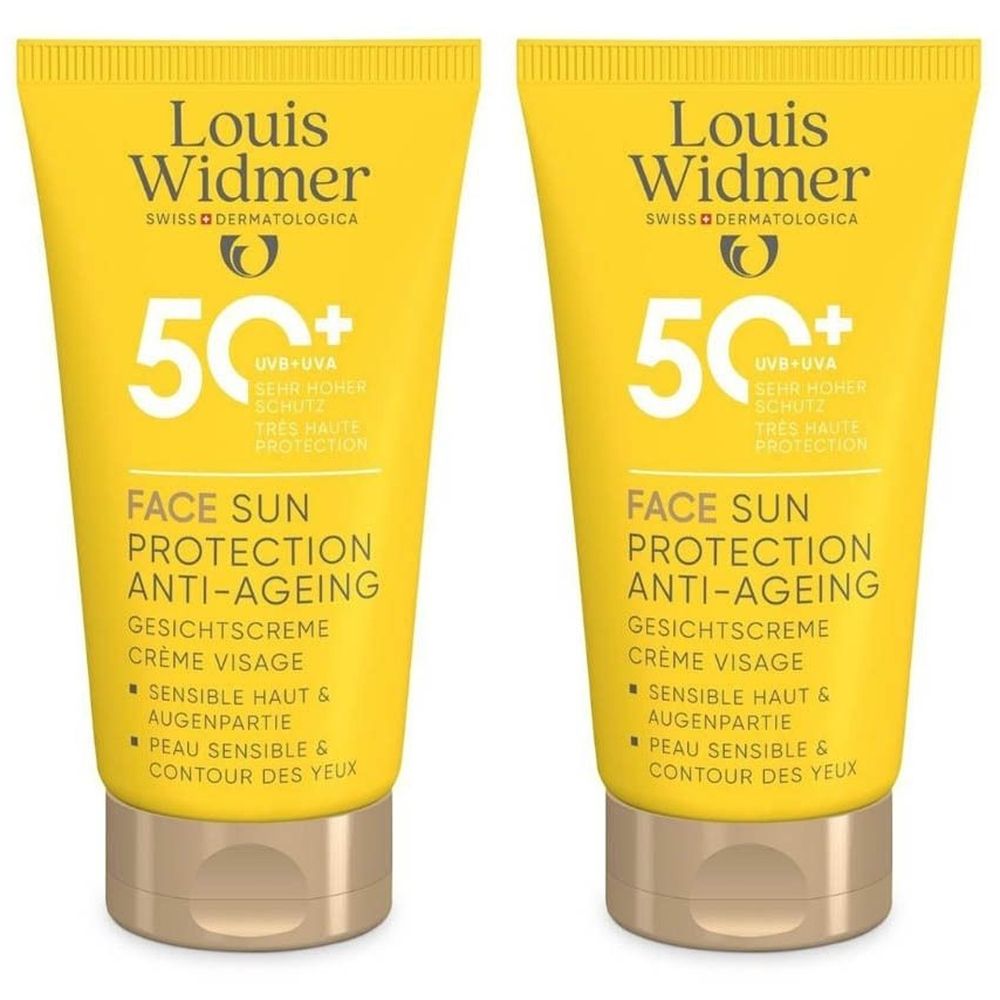 Twee gele tubes Louis Widmer zonnecrème SPF 50+. Opschrift: Face Sun Protection Anti-Ageing. Voor gevoelige huid en oogcontour.