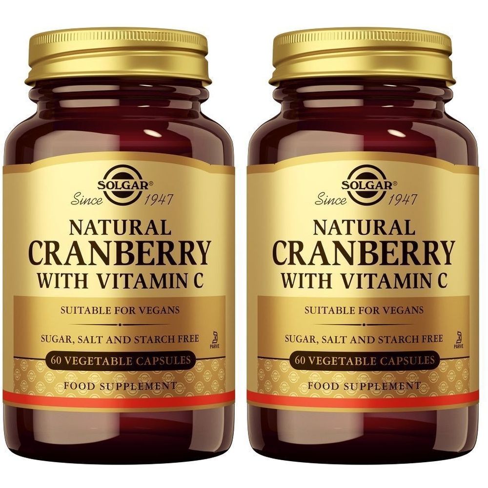 Twee flessen Solgar Cranberry met vitamine C. Bruine glazen flessen met gouden doppen en etiketten. Opschrift: Natural Cranberry.