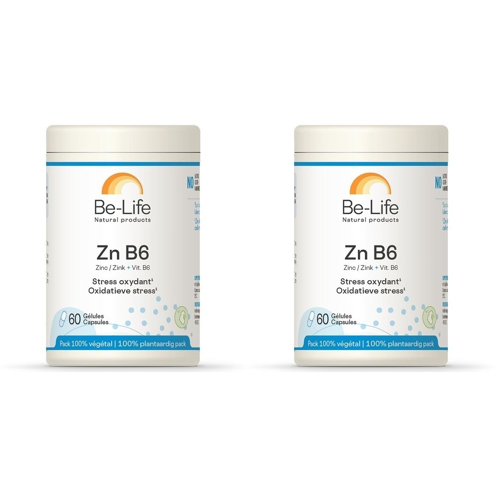 Twee witte cilindrische potten met etiketten. De etiketten tonen "Be-Life Zn B6" en "60 Capsules".