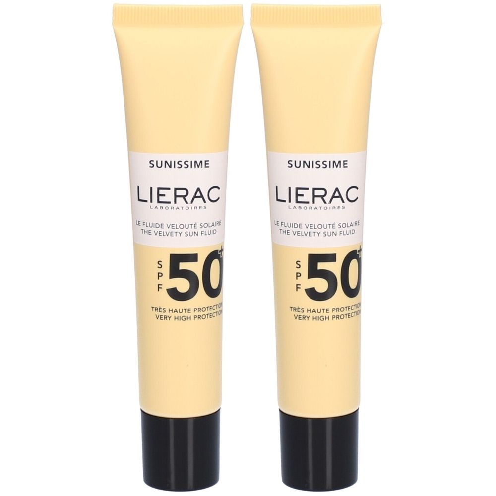 Twee tubes Lierac Sunissime Le Fluide Velouté Solaire SPF 50+. Beige tubes met zwarte dop. Tekst: SPF 50, Sunissime, Lierac.