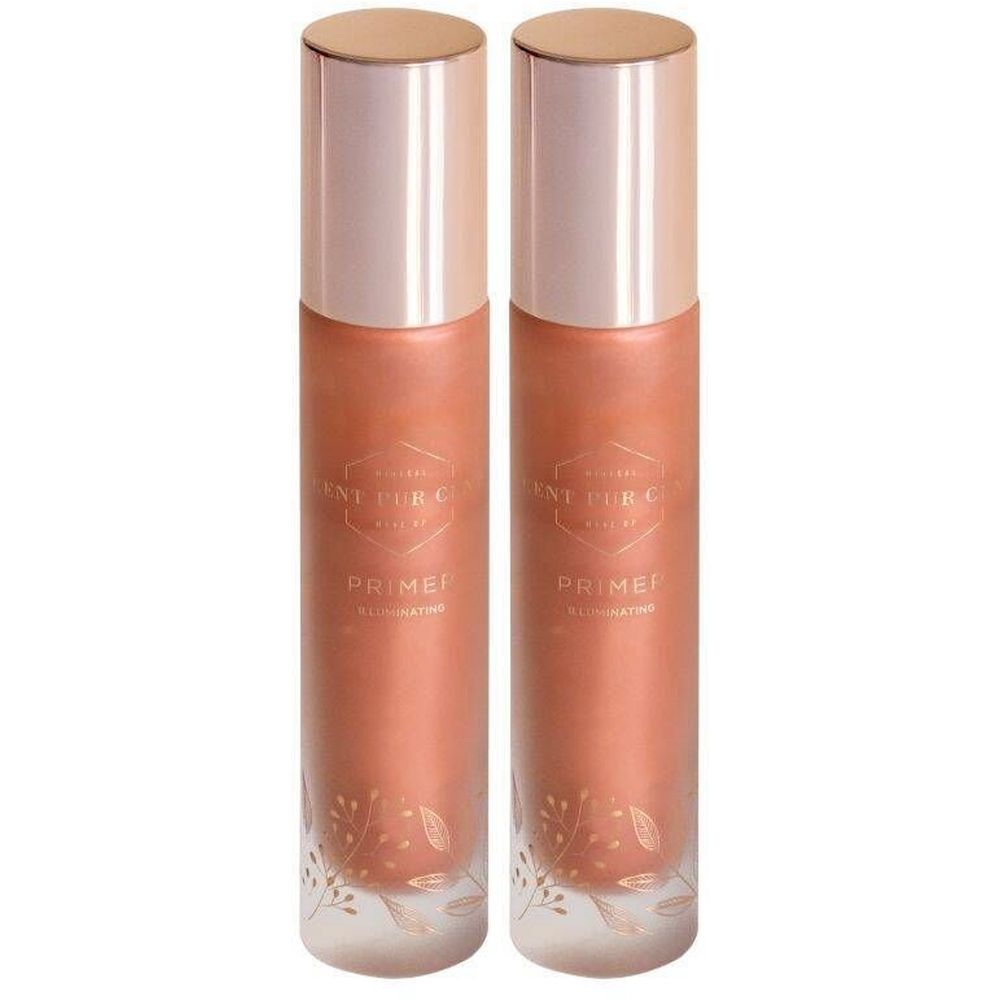 Deux flacons de Cent Pur Cent Illuminating Foundation. Liquide rose dans des flacons transparents avec des bouchons dorés.