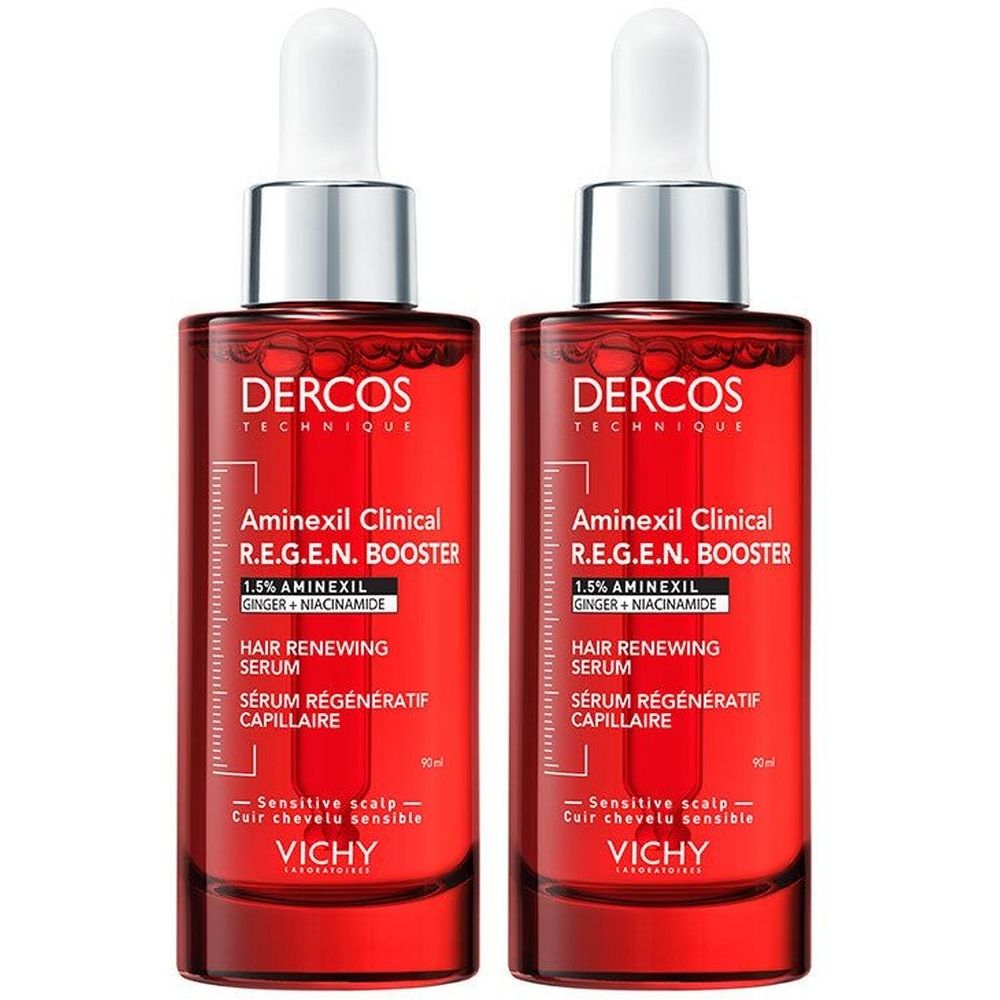 Deux flacons rouges de sérum. Inscription: Dercos, Aminexil Clinical R.E.G.E.N. Booster, 1,5% Aminexil, Gingembre + Niacinamide. Pour cuir chevelu sensible.