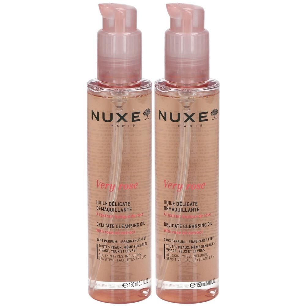 Twee flessen NUXE Very Rose reinigingsolie met roze pompdeksel. Opschrift: Huile Démaquillante, Delicate Cleansing Oil.