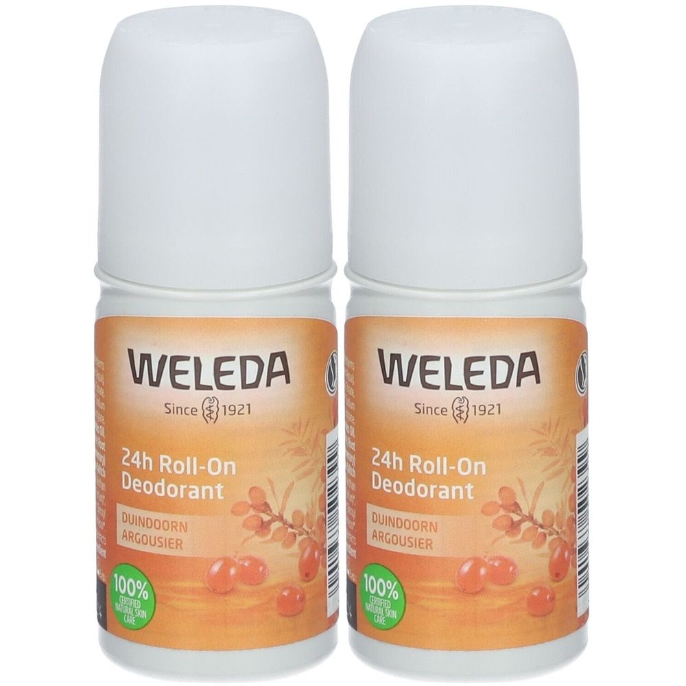 Deux déodorants roll-on. Bouchons blancs, étiquettes oranges avec texte: WELEDA, 24h Roll-On Déodorant, Argousier. 100% ingrédients naturels.