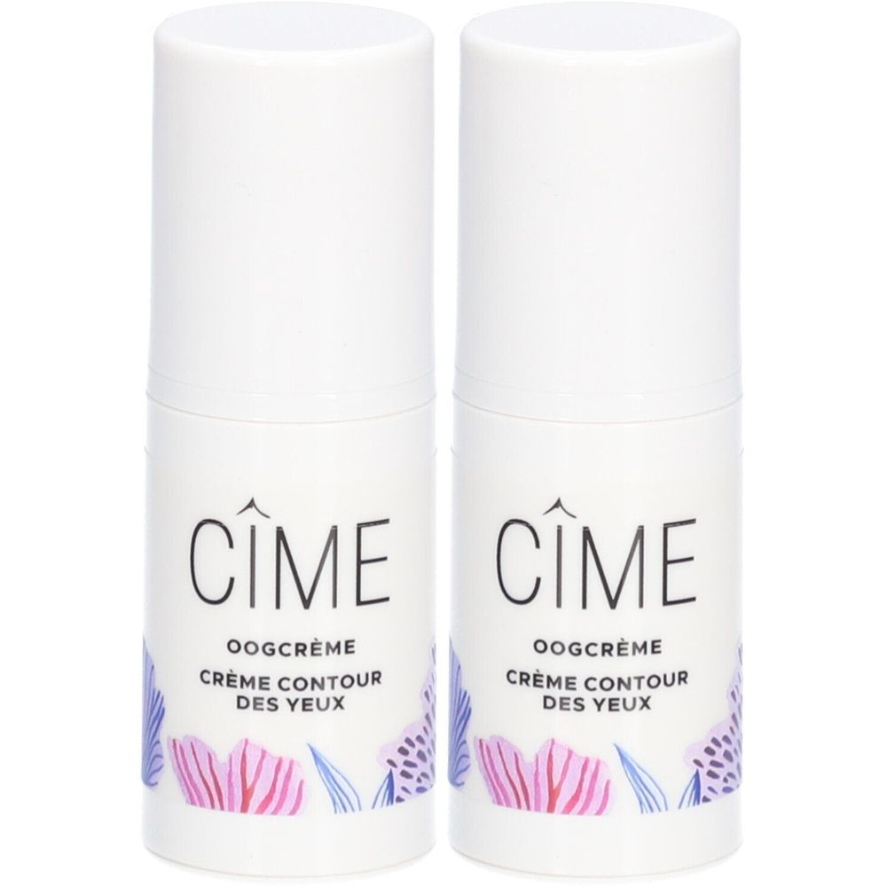 Twee witte cilindervormige flacons. Opschrift: Cîme, Oogcrème Crème Contour des Yeux. Bloemenmotief.