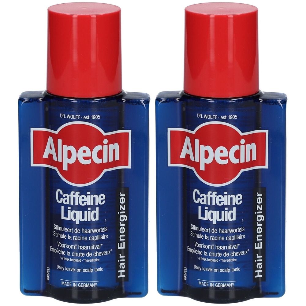 Twee flessen Alpecin Caffeine Liquid. Blauwe flessen met rode dop. Opschrift: Alpecin, Caffeine Liquid, Hair Energizer.