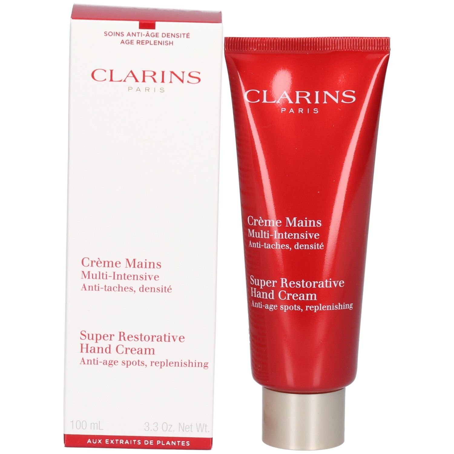 Clarins handcrème tube naast de witte verpakkingsdoos. Beide tonen productinformatie.