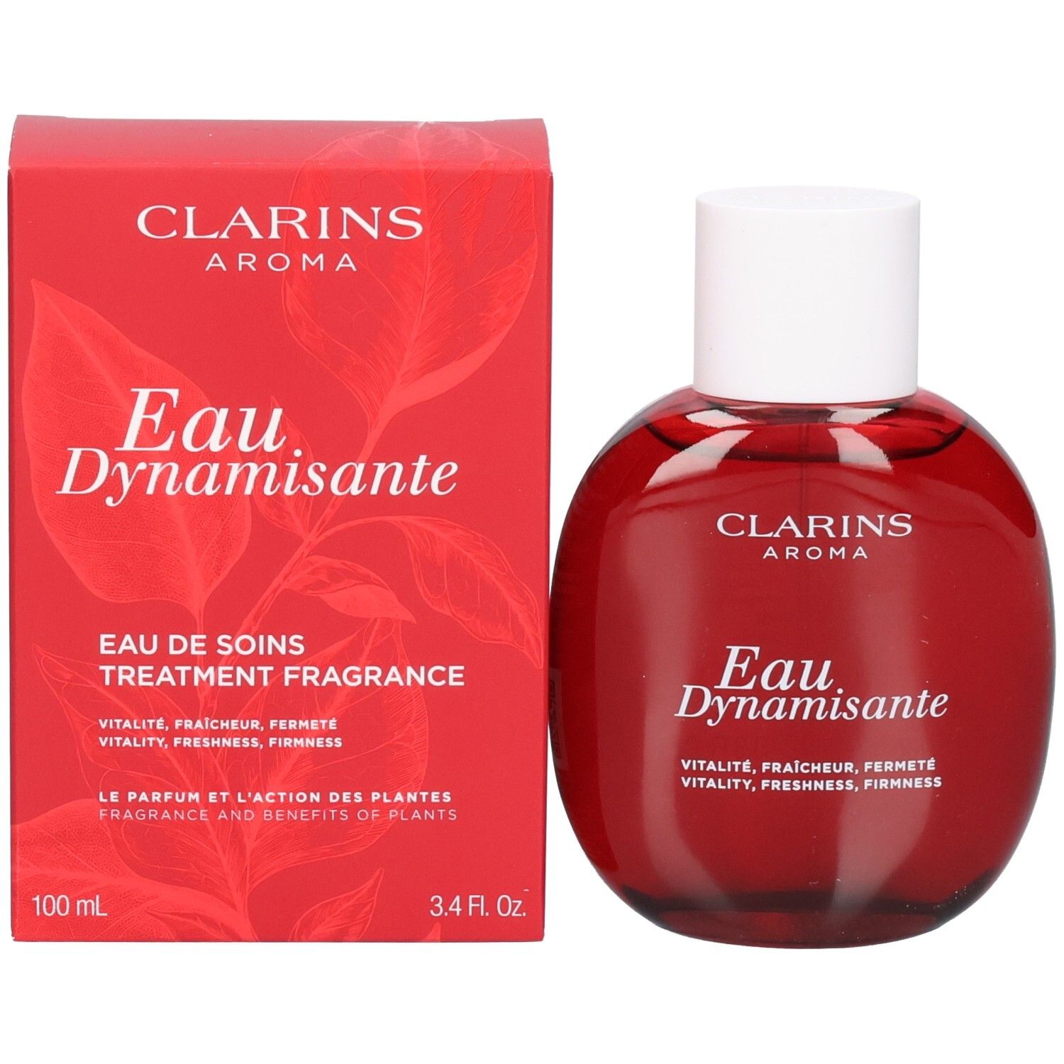 Clarins Eau Dynamisante fles en verpakking. Rode doos met bladerenmotief, fles met rode inhoud.