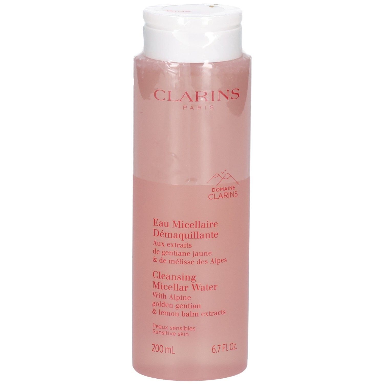 Clarins Eau Micellaire Démaquillante dans une bouteille transparente avec liquide rose et bouchon blanc.