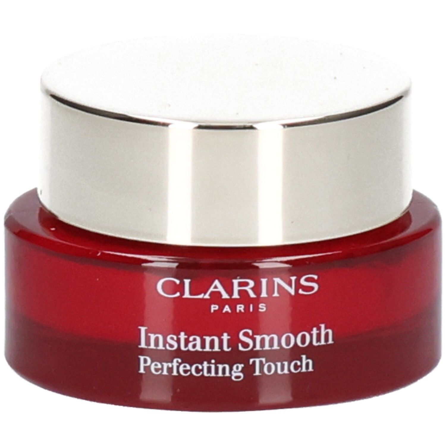 Clarins Instant Smooth Perfecting Touch potje, rode glazen basis, zilveren deksel.