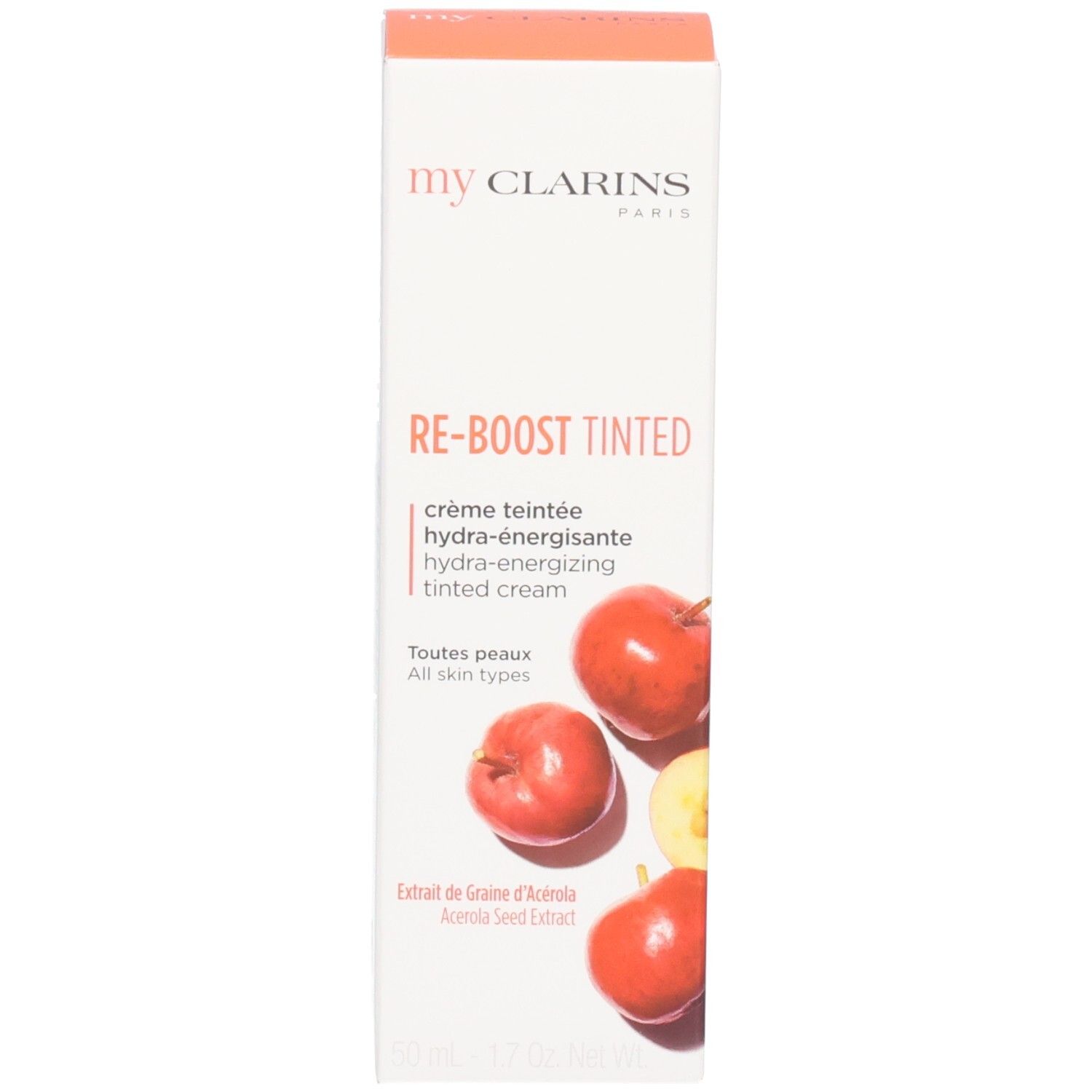 Kartonnen doos met sinaasappels en opschrift "my CLARINS RE-BOOST TINTED".