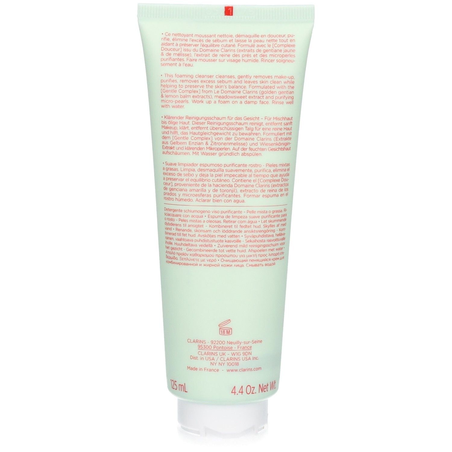 Dos d'un tube vert pâle de nettoyant Clarins. Contient des informations sur le produit et les ingrédients.