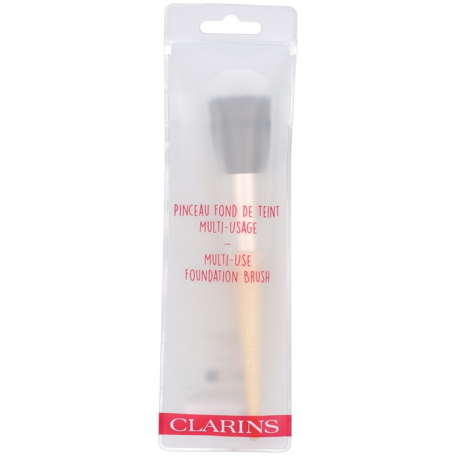 Pinceau Fond de Teint Multi-usage Clarins dans son emballage transparent.