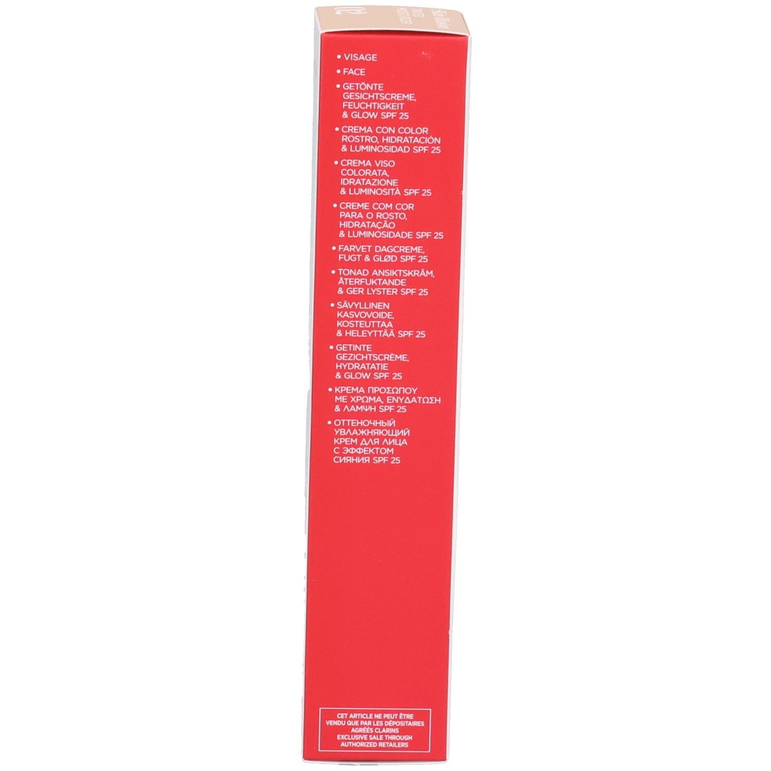 Zijaanzicht van de Clarins Skin Illusion verpakking met meertalige productinformatie.