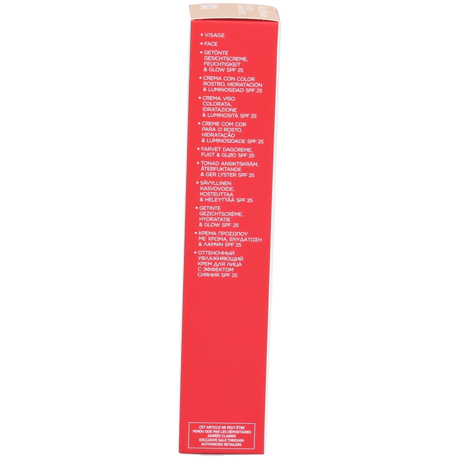 Zijde van Clarins Skin Illusion verpakking met meertalige productbeschrijvingen.