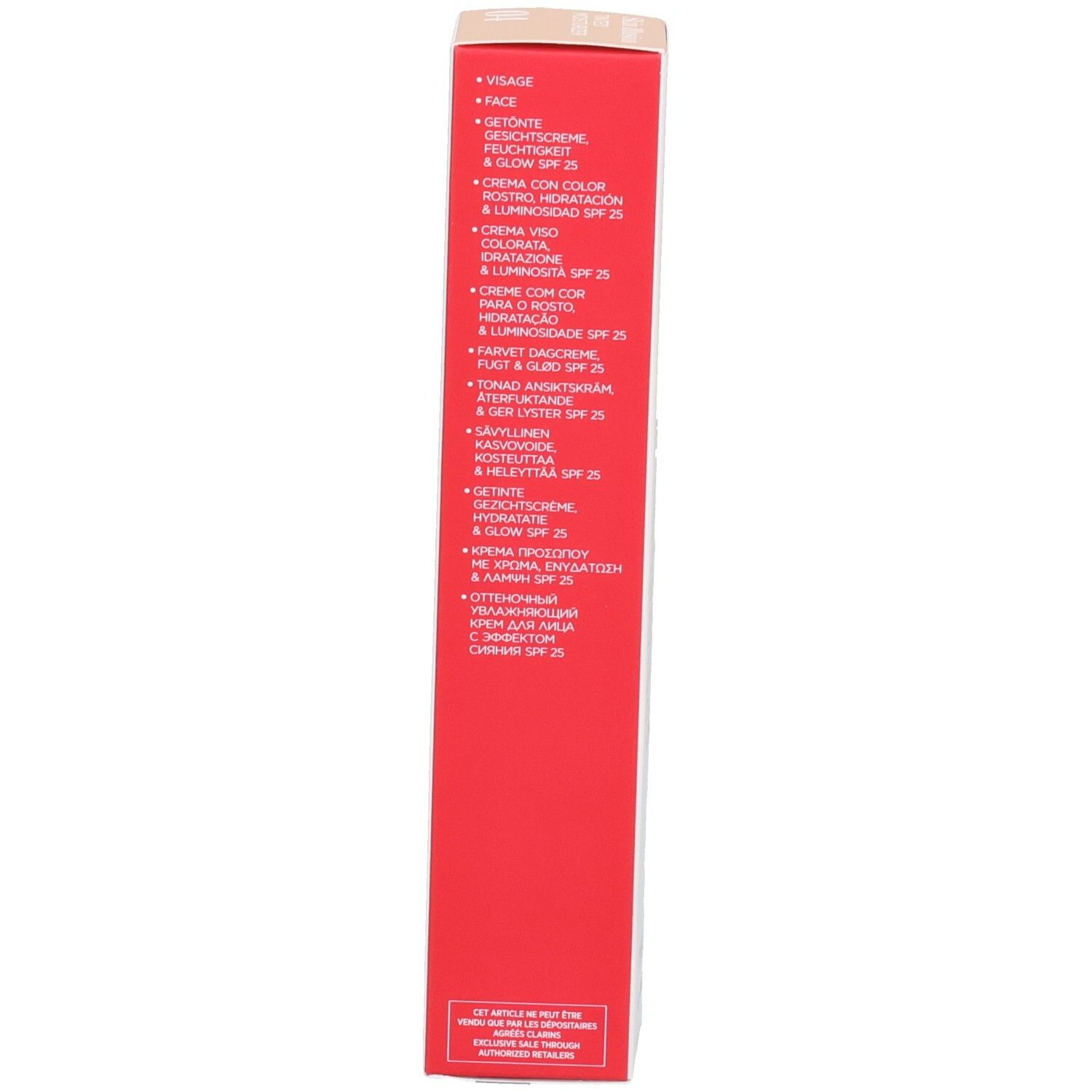 Vue latérale de la boîte de crème teintée hydratante Clarins Skin Illusion avec zones d'application.