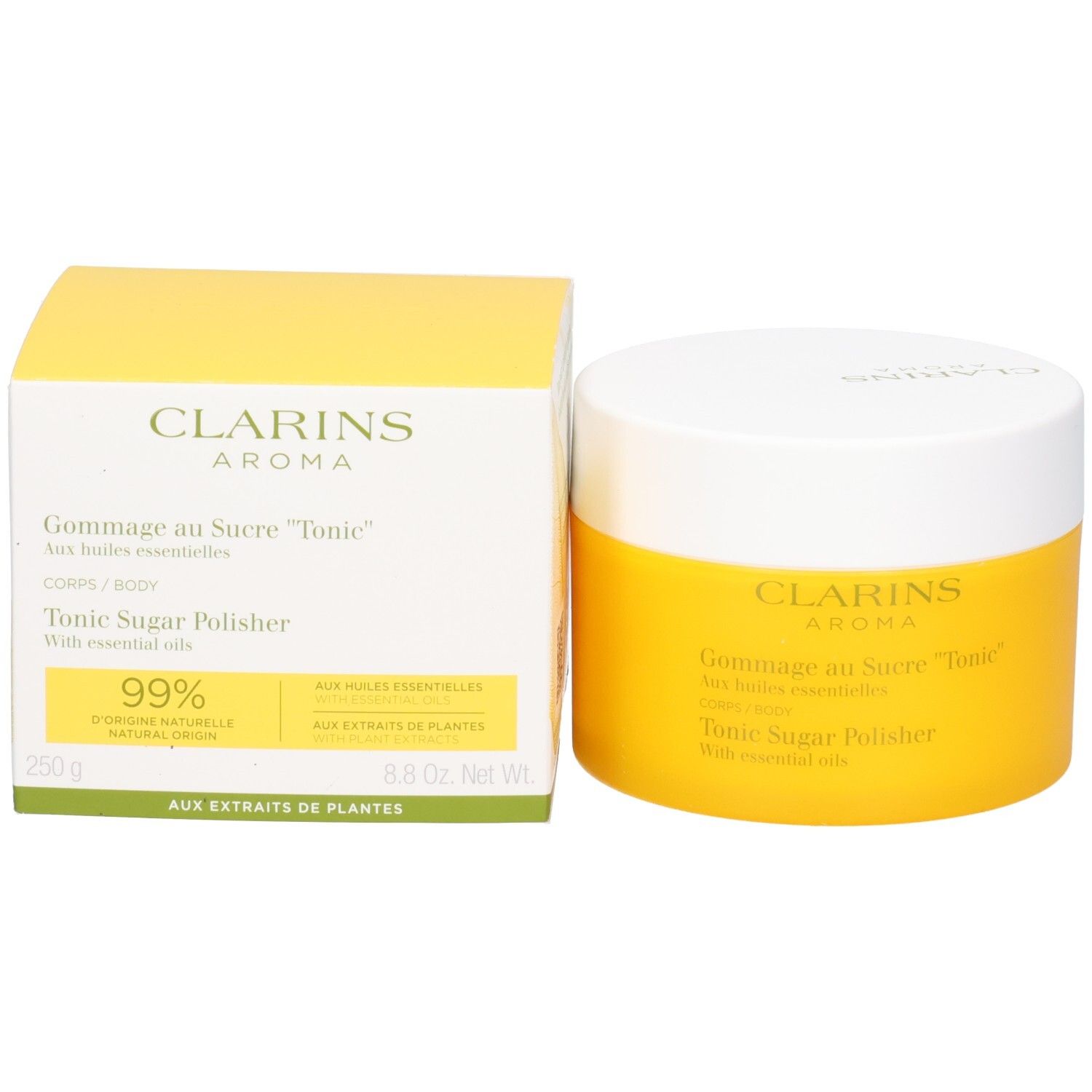Clarins Gommage au Sucre Tonic pot et emballage, jaune avec couvercle blanc et texte.