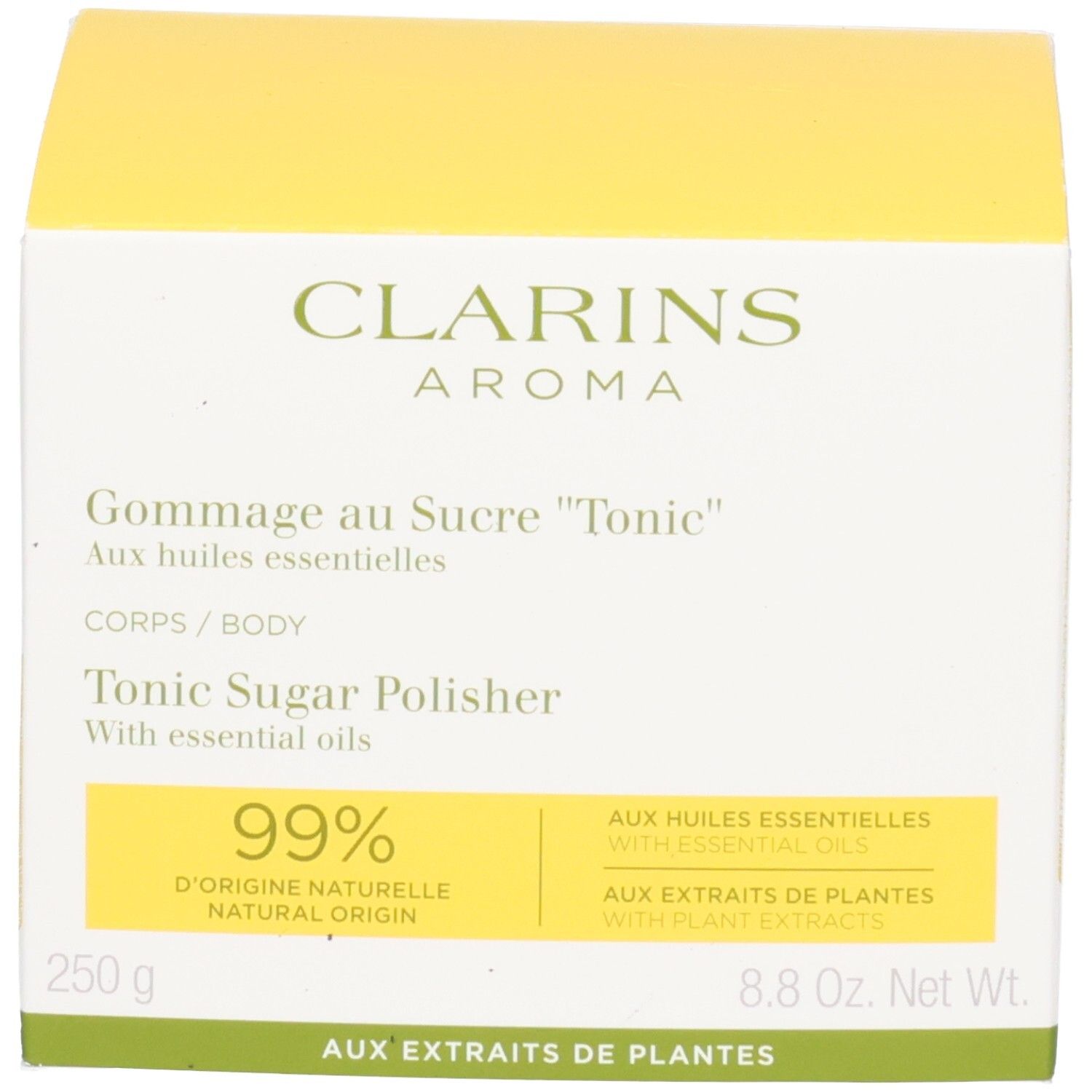Clarins Gommage au Sucre Tonic emballage, jaune avec couvercle blanc, texte et indication 99%.