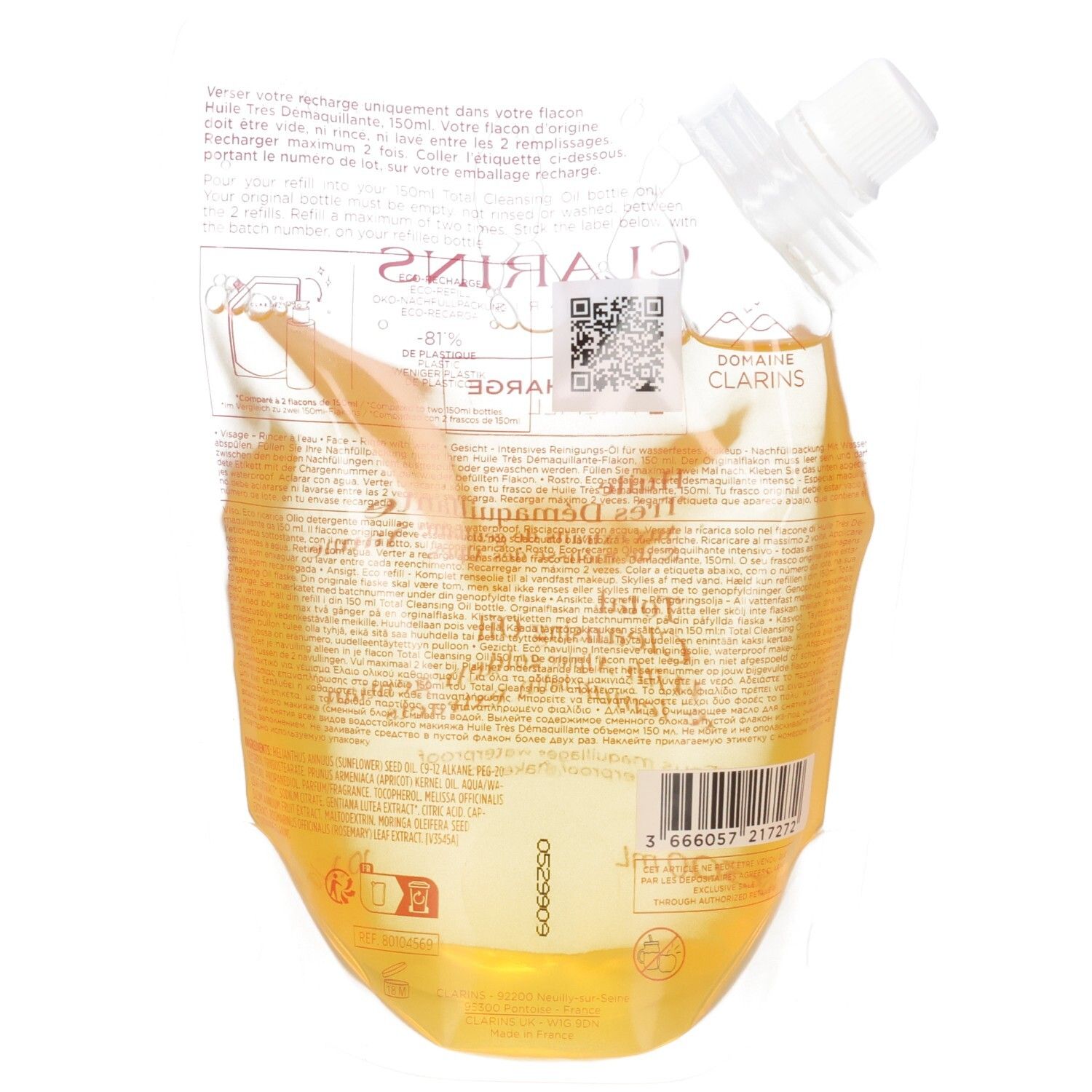 Clarins navulverpakking voor reinigingsolie. Achterkant met productinformatie en barcode. Transparante zak met gele olie.