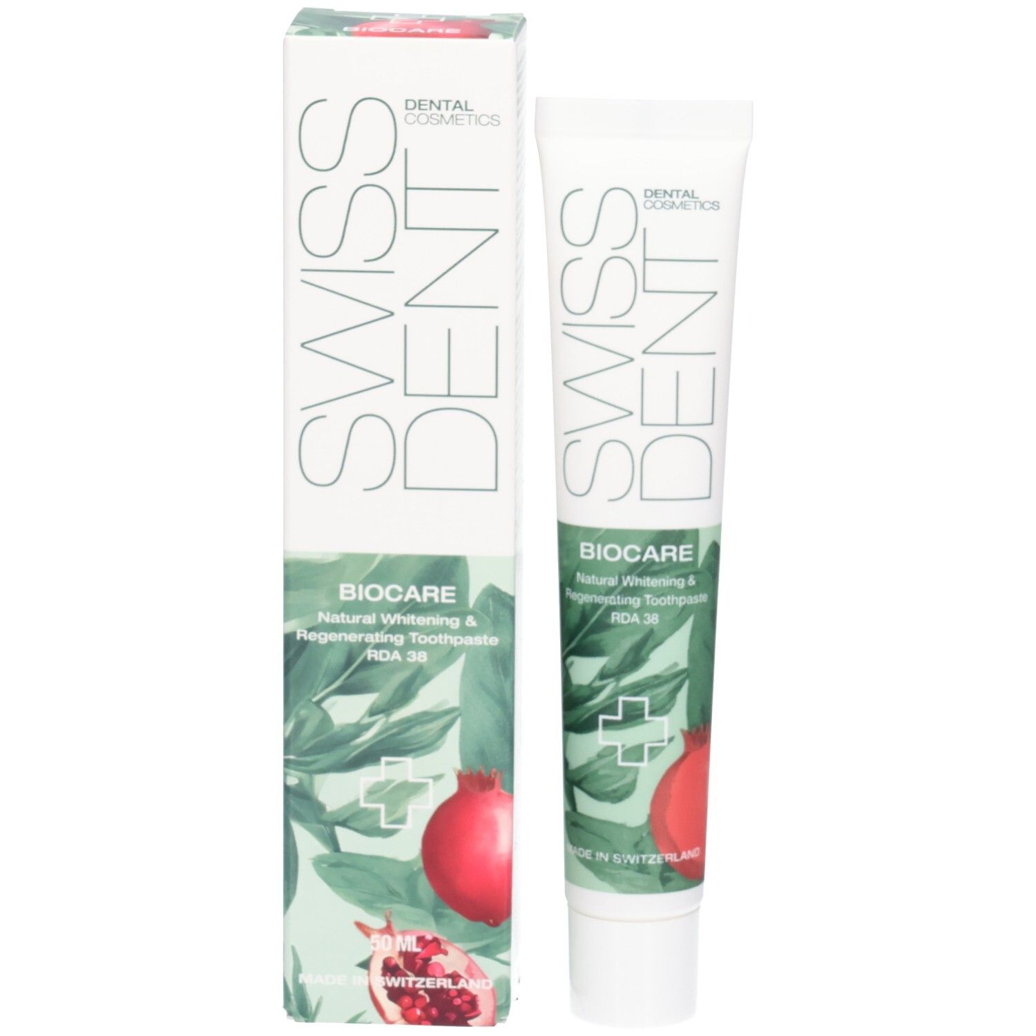 Tandpasta tube en doos. SWISSDENT en BIOCARE tekst. Granaatappel illustratie. Groen en wit design.