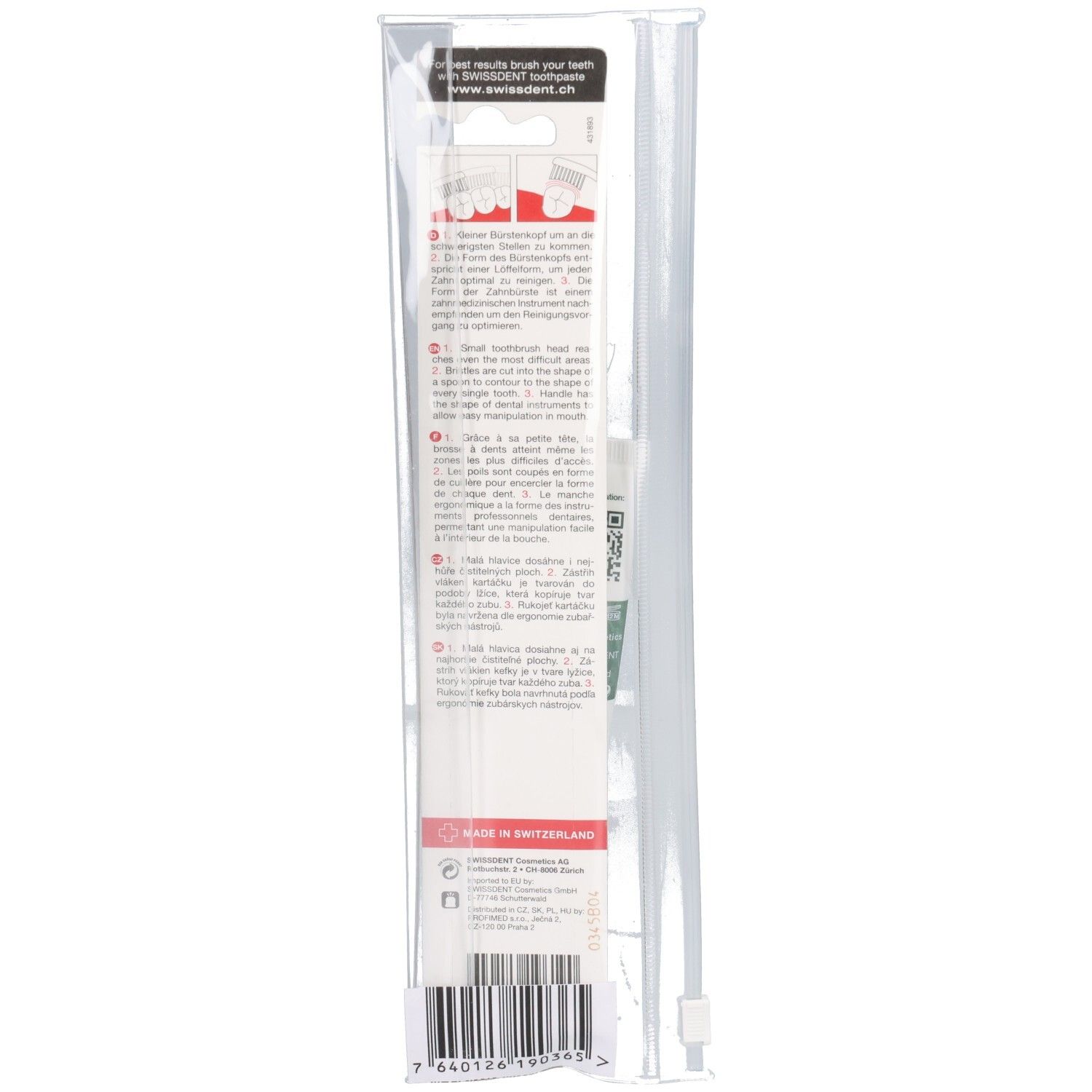 Achterkant van de reisset. Bevat instructies en barcode. Opschrift: Made in Switzerland.