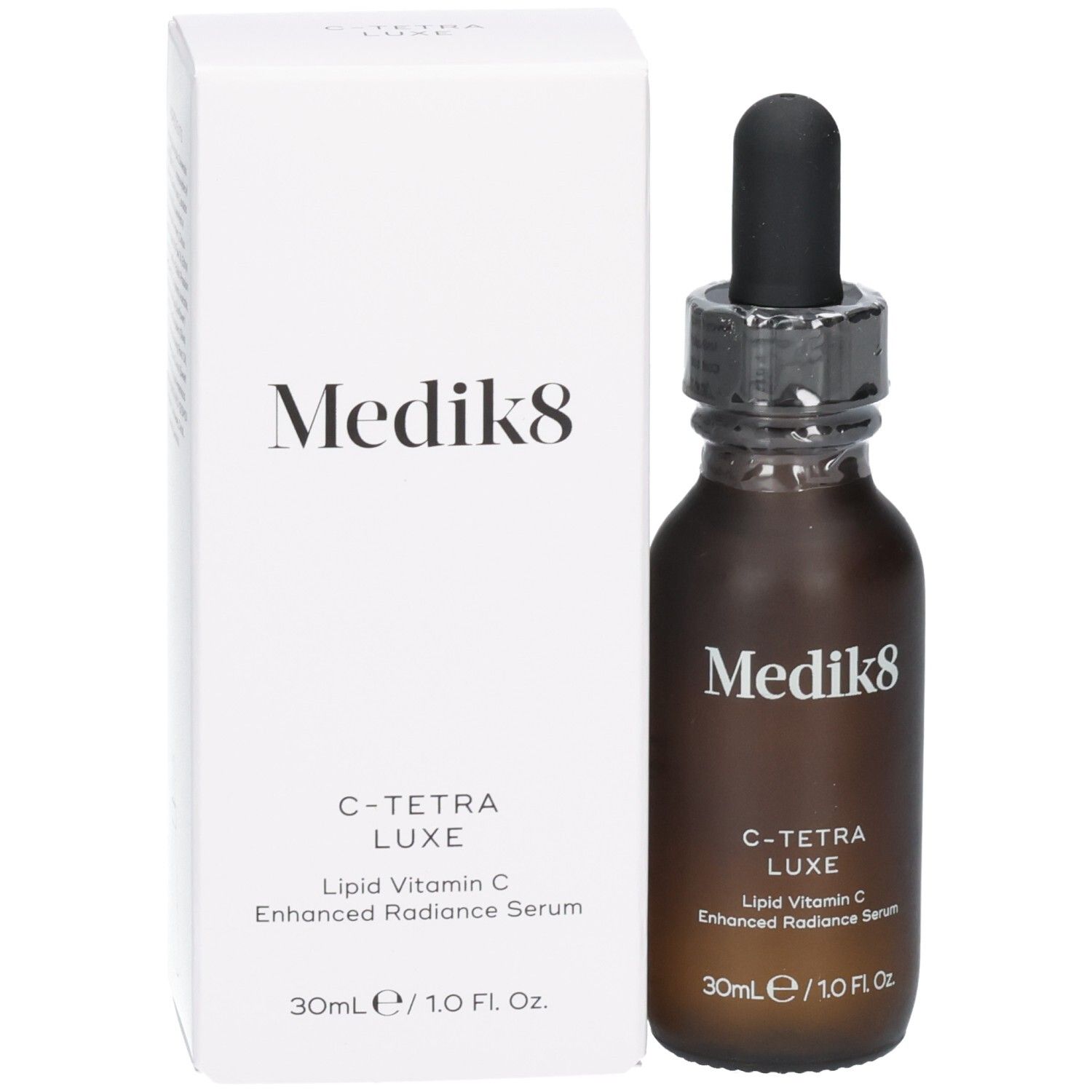 Flacon de sérum Medik8 C-Tetra Luxe à côté de son emballage produit. 30ml.