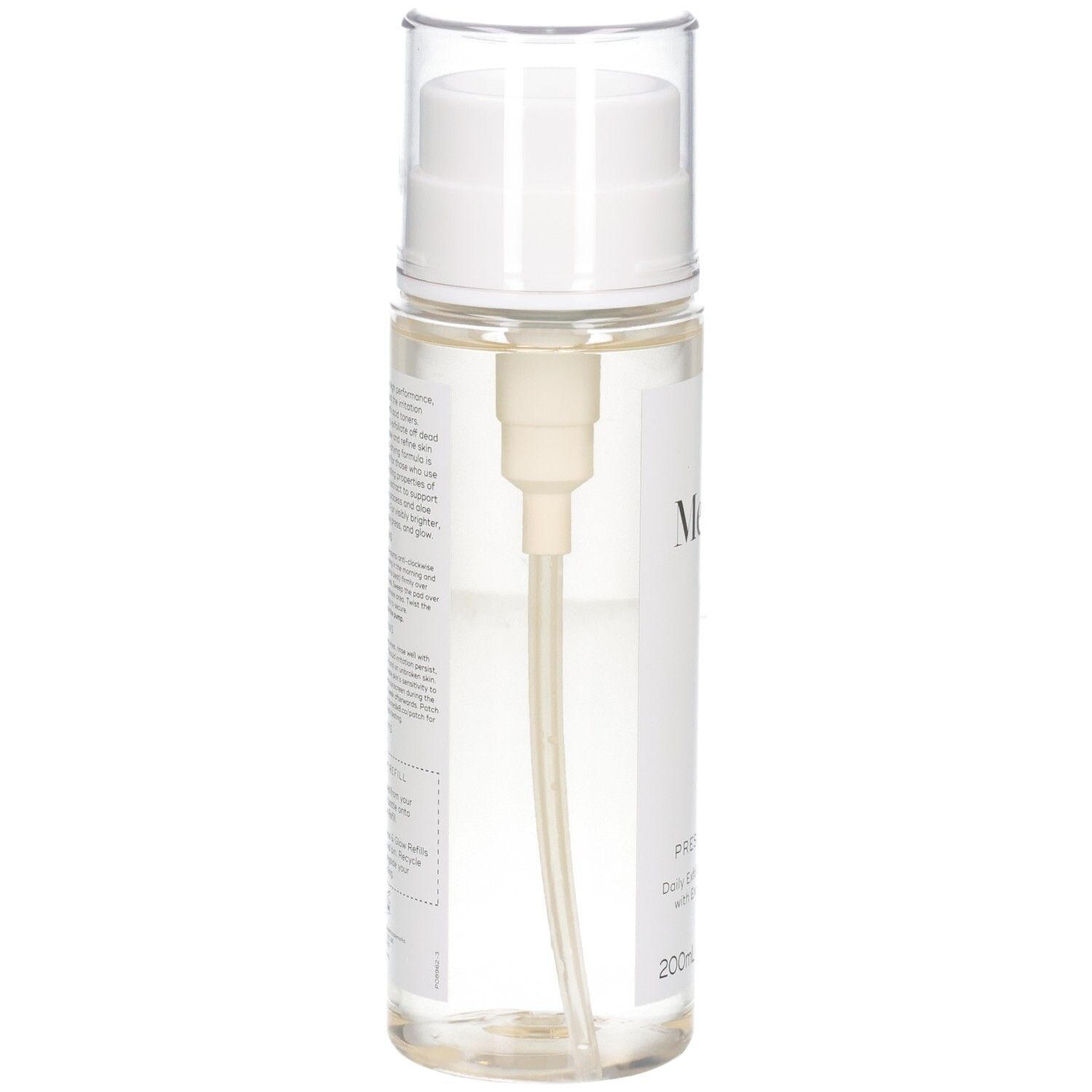 Arrière du Medik8 Press & Glow Toner avec informations détaillées sur le produit et mécanisme de pompe.