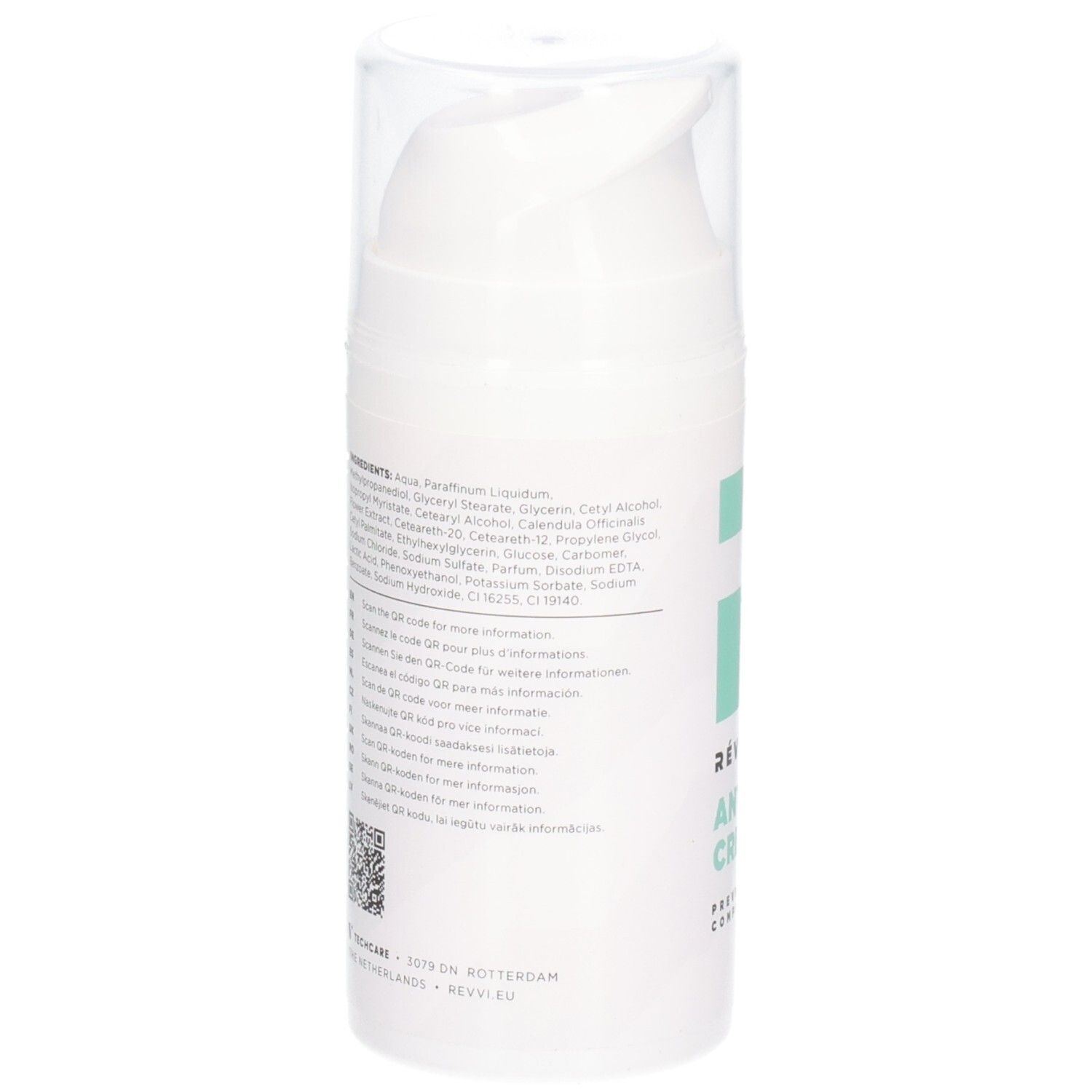 Achterkant van de witte fles. Tekst met ingrediënten en QR-codes. Transparante dop. Merk RÉVVI.