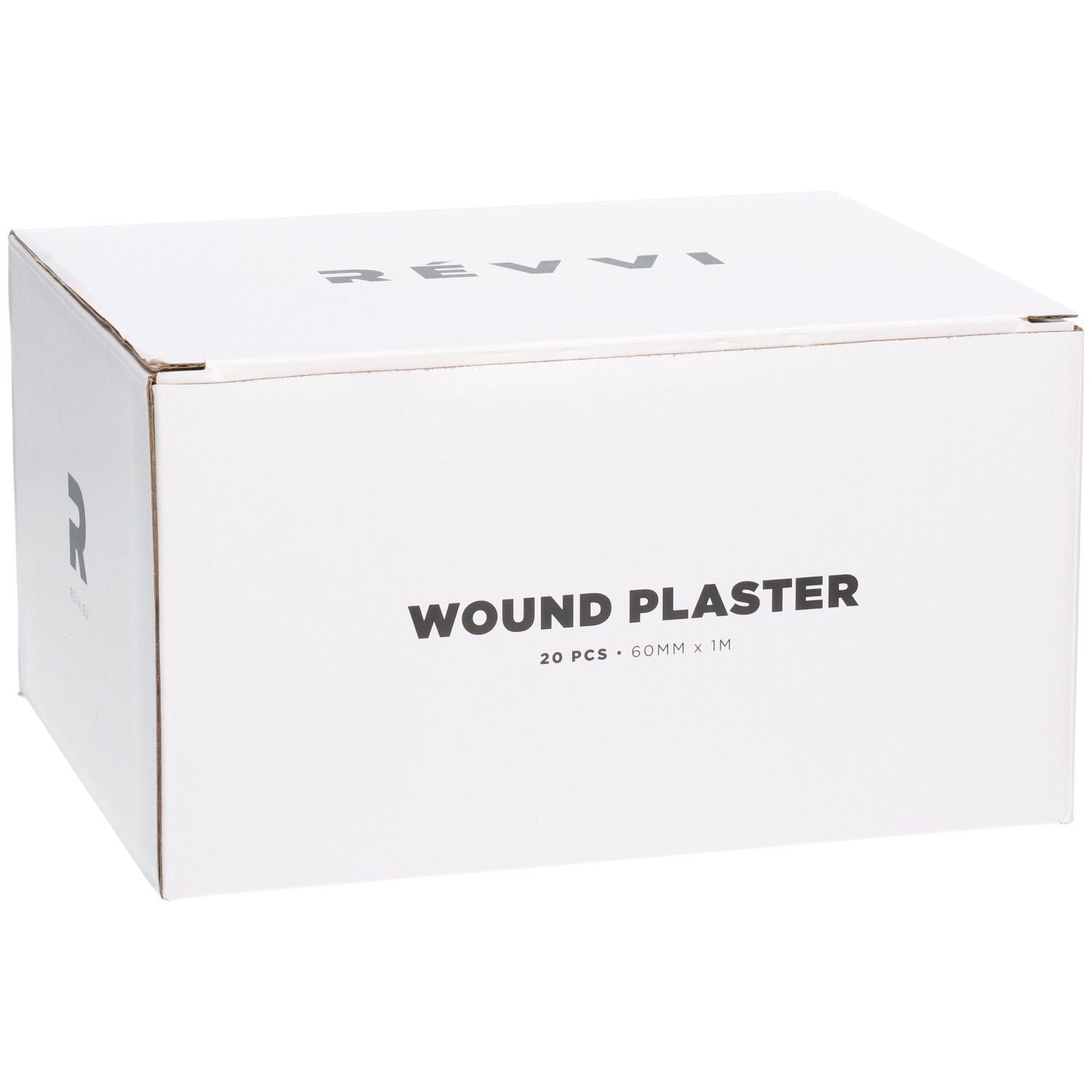 Witte doos met opschrift WOUND PLASTER, 20 stuks, 60mm x 1M. Op de zijkant: RÉVVI.